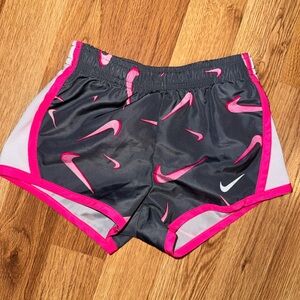 Nike Black Athletic Shorts with Pink Swoosh Accents